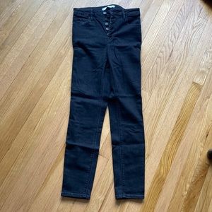 Black button fly high rise skinny jeans 27